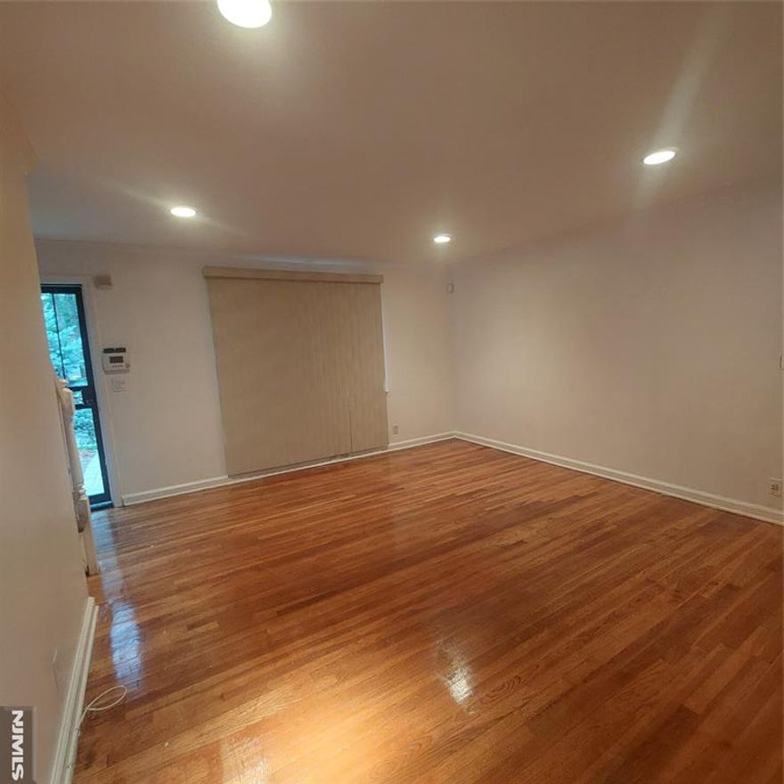 4 Bedroom 3 Full Baths with full finished basement. Modern Eat-in Kitchen featuring granite counters. Slider off kitchen to lovely deck and fenced in yard. Home features central air, updated plumbing, updated electric, newer furnace, newer boiler, hardwood floors, expanded 4 car driveway, 1 car attached garage, EV charging station, fire pit, shed, and much more. Conveniently located near houses of worship, nyc transportation and parks. Don't let this one pass you by!