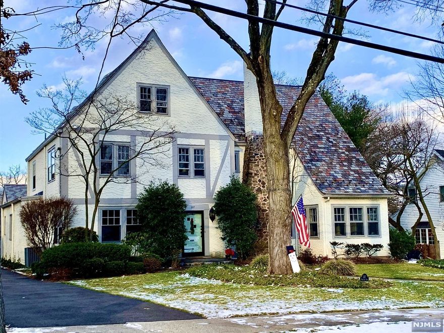 Charming Stately 6 bedroom, 3 full, 2 half bathTudor on Ridgewood's Westside, In the Willard School district.Light filled Grand Foyer welcomes you home. Fm Living rm w/gas Fpl & 2 sets of built ins.Library office w/built ins and Fr doors to the wrap around deck, 2nd office w/9 windows and exposed beam high ceiling.Additional Fr doors lead to 26x24 Greatroom w/sliding glass drs to wrap around deck, a wall of rich wood built ins w/wood Fpl. 33x18 Chef's ktch w/ cobalt blue Ctr Island w/ 2 sinks, 2 dishwashers,2 disposals and Jen-Aire range, Cabs w/ glass doors to showcase your collectibles,2 wall ovens,6 burner range & XL pantry &much more. Formal dining, Wine Pantry, Powder rm,& mudrm finish 1st fl.Turned staircase to 2nd fl Primary Ste w/claw footed soaker tub & shower,3 Brs,FBT w/soaker tub & shower. 3rd Fl(au-pair & Guest ste) 2 Brs, FBT & Playroom. Finished basement w/new Lam FLR, Laundry, FAM Rm. Hardwood on 1,2&3. Apprx 1/2 windows newer Pella bal set to replace 4/22