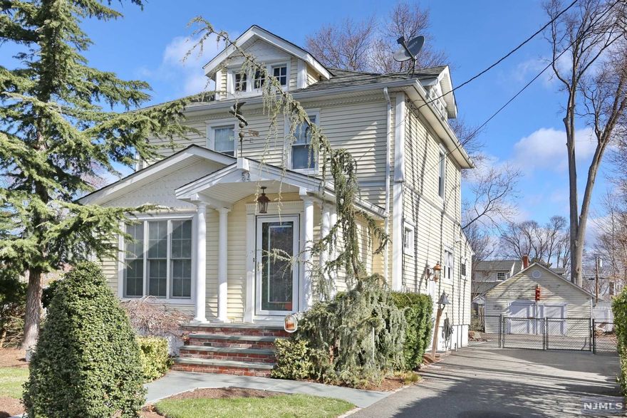 Welcome home to this beautiful colonial located on a quiet street in the heart of Emerson. This house sits on a big lot, over a quarter of an acre offering a yard perfect for entertaining. The main level features an entry foyer, open living room, dining room, office/den, the spacious, modern eat it kitchen with SS appliances including the viking stove, powder room & laundry room. The upstairs has all three of the bedrooms, a full bathroom & walk up access to the attic. The full finished basement has a rec room, bonus room/den & another full bathroom. With so many great updates & features such as hardwood flooring throughout, central A/C, lots of storage, 2 car detached garage at the end of the large driveway with ample parking, manicured landscaping & a backyard oasis with a gorgeous koi pond, this truly is an amazing place to call home. Close proximity to parks, places of worship, train station & bus stops, plenty of shopping & restaurants & Emerson's highly regarded schools!