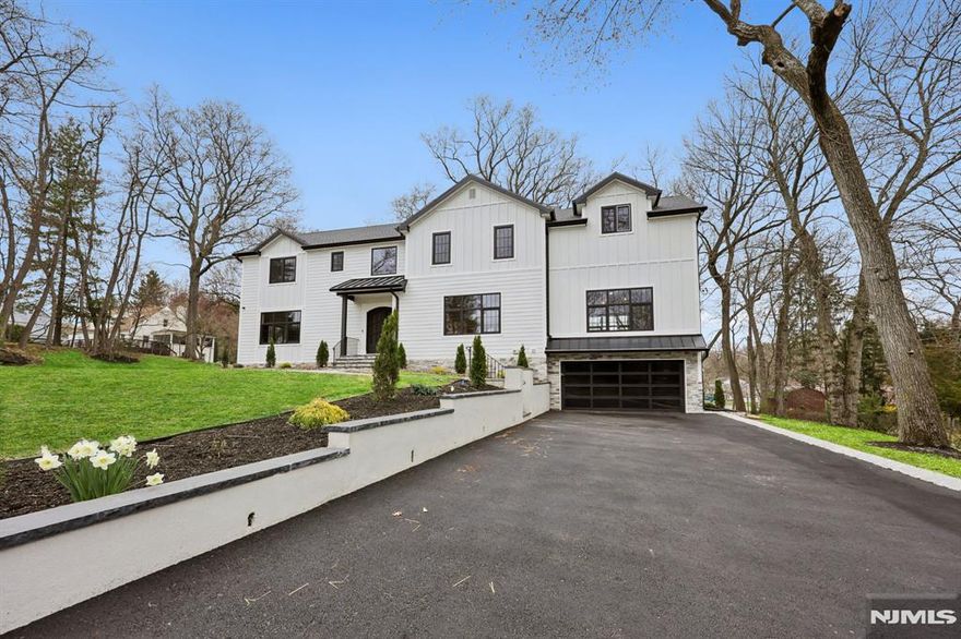 Welcome to this 2025 custom built 6-bed 5.1-bath estate! Step into a 2-story foyer w wide-plank hardwood, custom millwork & arch entryways. The kitchen stuns w SS appliances & 12ft island w waterfall quartz counters & breakfast bar. Dine in the formal dining room or the sunlit dinette w wet bar, built-in seating & walk-in pantry. Unwind in the formal living room w fireplace & built-in cabinets or the family room w second fireplace. The primary suite is a sanctuary w vaulted ceiling, WICs & spa-like ensuite bath w walk-in shower. The 1st floor ensuite bedroom adds flexibility, while three 2nd floor bedrooms w ensuites/WICs offer privacy for all. The large basement offers an added bedroom w full bath & egress. Future-ready smart home w smart outlets, audio system, pre-wired security system & touchscreen controls. The exterior impresses w stone-accent & rear deck overlooking 0.86AC lot. Experience this custom build, perfectly blending luxury, comfort & smart living in a prime location!