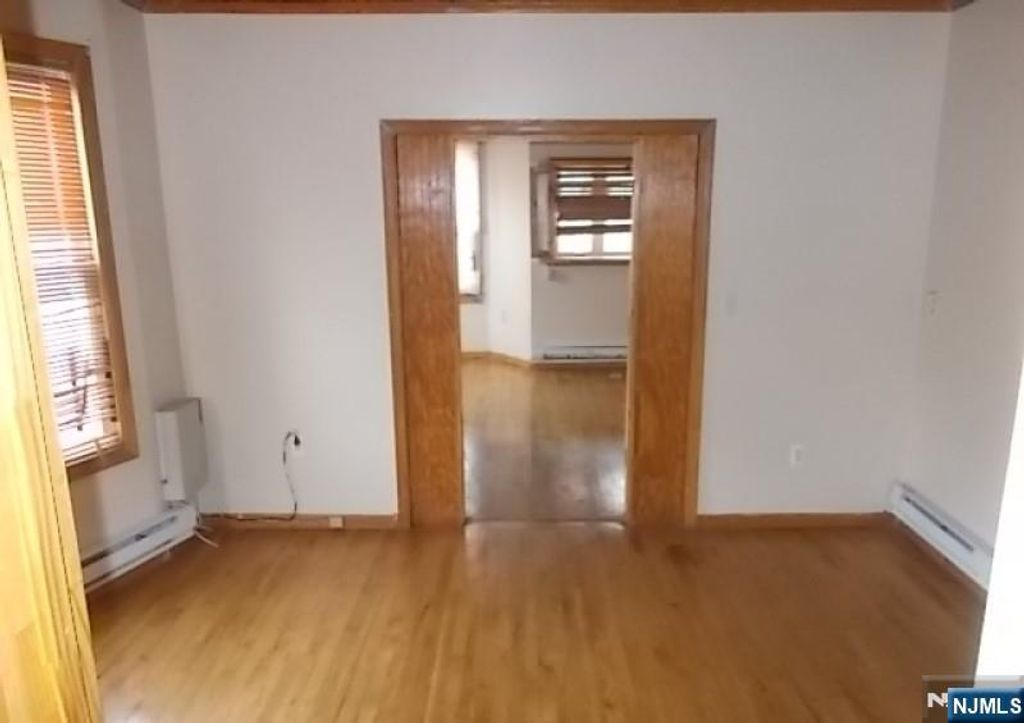 Photo of 129 Wakeman Avenue, Newark, NJ 07104 (MLS # 25037996)