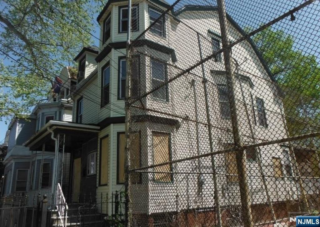 Photo of 129 Wakeman Avenue, Newark, NJ 07104 (MLS # 25037996)