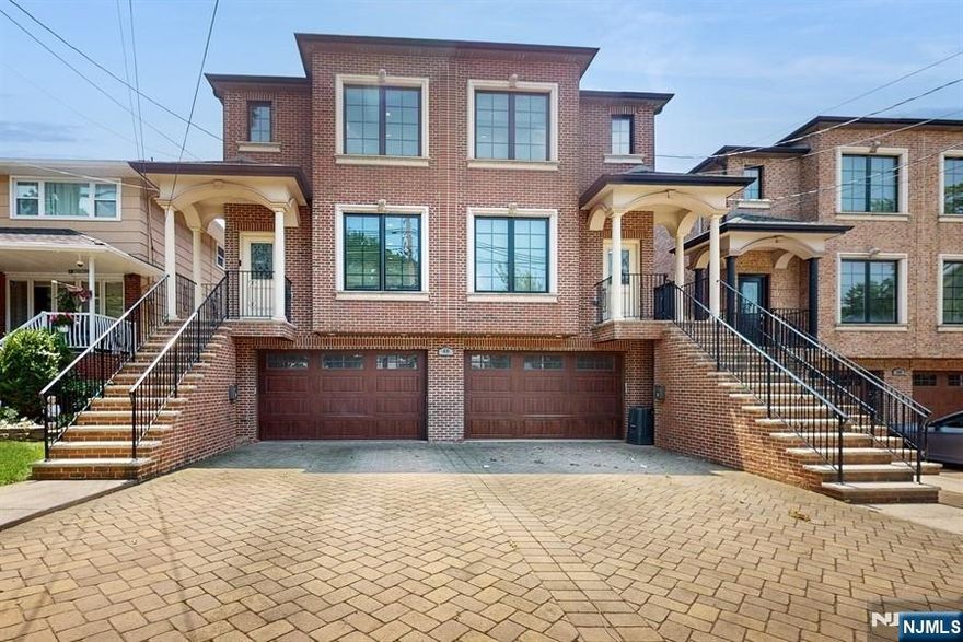 Facing East Appx.12 years young solid brick oversized duplex with extra rooms.Modern eat-in kitchen with granite counter top,Quality maplewood cabinets.All S/S appliances.All hardwood floors through out.Central air conditioning,Central vacuum system.A block from Broad Ave and Grand Ave.Very convenient location.Walk to NYC Bus Stop. 4 Bedrooms,3.5 bathrooms,140' long deep lot.