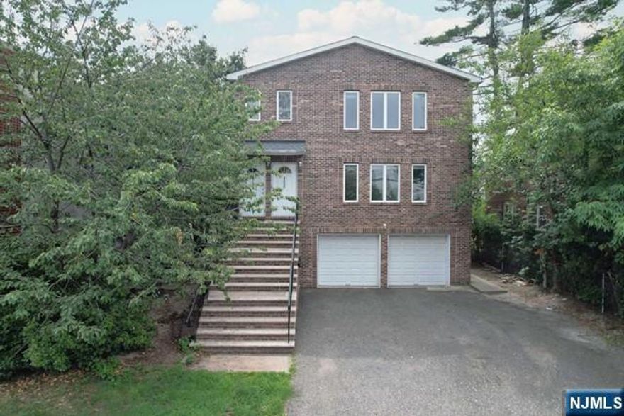 LOCATION!!! Very Spacious High ceiling 3 bedrooms, 2 full bathrooms 2nd floor Unit. Hardwood floors throughout, granite counter top kitchen, dining room, living room, two full bathrooms including Master bathroom, washer and dryer in unit, good size closets, quiet deck for privacy. PERFECT LOCATION! best part of Ridgefield, close to everything, 1 minute to bus stop to Manhattan. Central heating and cooling system, baseboard. Storage space on ground level. The property is located on Bergen Boulevard, but it is well soundproofed, and all the bedrooms are situated in the back, so you donâ€™t hear any noise.EXCELLENT CONDITION, 1 car garage and 1 drive way space included.