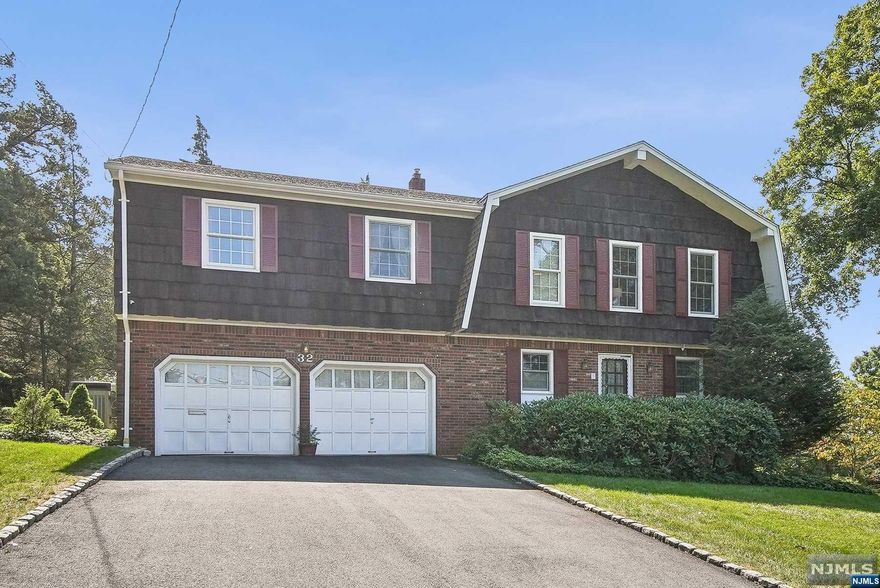 First time this well maintained Bi-Level has been offered in sought after Packanack Lake. Location is key & this home has it. Enter into the first level with a warm & inviting family room w/brick fireplace & sliders to the oversized deck overlooking the large property. A bedroom, powder room/laundry room, storage and utilities complete the first floor. The second level features the living room, formal dining room, large eat-in-kitchen with tons of maple cabinetry and stainless steel appliances, 3 bedrooms including a primary bedroom with walk-in closet and ensuite bathroom and an additional full bath. There's hardwood flooring throughout. The two-car garage has been used as a work-shop/lab but can be removed for added space. There's an additional storage room with outside access to the right of the house. Enjoy all the lake has to offer with Clubhouse, 2 beaches, endless clubs, sports and activities. Golf and tennis is an additional expense. Lake dues current.