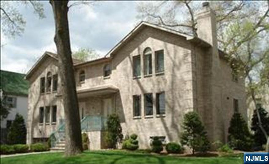 Very large brick duplex on friendly resident area, one block from Elementary, Jr.High & Sr.high schools. One of the best school systems in New Jersey. Walk to NYC & Local bus stations. Walk to downtown. Less 10 mins. to George Washington Bridge and all NJ Highways. Kitchen was renovated. LR/wood burn fireplace, Dinning Rm., Kitchen/Dinning area/Deck, Family Rm., 3 Bedrms, 3 Baths and Powder Rm. one car Garage, 2 parking spaces. Children can play in the back yard. Owner does lawn care and has NJ real estate license. Any question email to: evazah@gmail.com