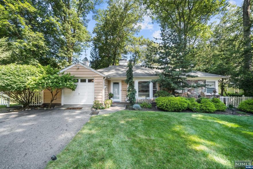 Welcome to this charming 2-bedroom, 1-bath ranch nestled in the heart of Ramsey, NJ. If you're seeking a home that combines comfort, convenience, and natural beauty, look no further. This delightful property offers a serene escape from the hustle and bustle of everyday life, making it the perfect sanctuary to call your own. Step inside and be captivated by the spacious living room that awaits you. This expansive area is bathed in an abundance of natural light, courtesy of the numerous large windows that surround the space. The harmonious blend of warm sunlight and the inviting ambiance makes it an ideal spot for relaxation and gatherings. As you venture outside, you'll be greeted by a private, park-like yard that's truly a nature lover's dream. One of the most appealing aspects of this property is its proximity to major highways, making commuting a breeze. You'll have easy access to all the necessities and luxuries Ramsey has to offer. Don't miss out on this opportunity!