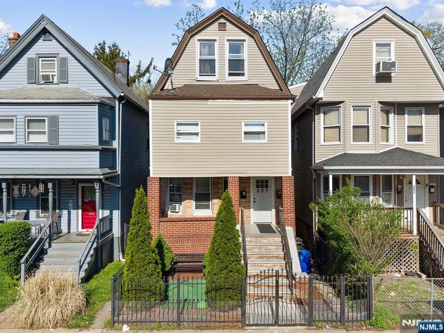 Beautifully renovated two-family home offering modern updates and functional living. Each unit features renovated kitchens and bathrooms with new appliances and updated finishes, along with new flooring throughout. The finished third floor provides additional living space, ideal for a variety of uses. The property also includes a spacious backyard suitable for outdoor enjoyment. Conveniently located near major transportation, shopping, and local amenities, this home presents a great opportunity for both owner-occupants and investors.