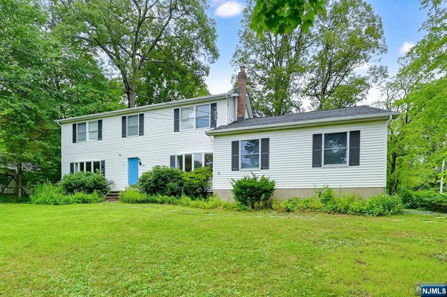 Exceptional Colonial Home Featuring 4 Bedrooms! This Property Boasts a Spacious Eat-In Kitchen Complete w/Breakfast Nook & Bar Seating, Enhanced by Sliding Doors to a Deck for Entertaining! The Formal Dining Rm is Adorned with a Bay Window Providing Views of The Lake! The Formal Living Rm, Along with a Large Den Area & Offers a 2nd Access to the Deck! The 1st Fl also Includes a Laundry Rm and a Main Half Bath for Convenience! The Master Suite is Equipped with Sitting/Dressing Area & Double Closets, with an Elegantly Designed En-Suite Bathroom! Each Bedroom is Generously Sized and Offers Storage! Oversized 2 Car Garage Provides Interior Access! Recent Updates Include an Interior Remodel in 2021, Featuring Exquisite New Flooring, New Washer & Dryer, A/C and High Eff Heat Pump, Smart Thermostats, and Wi-Fi Garage Access! 2023 Enhancements Incl a New Water Treatment Osmosis Filter Tap, Softener, Neutralizer, Refrigerator, & Septic System Upgrades & Newly Paved Driveway in 2024