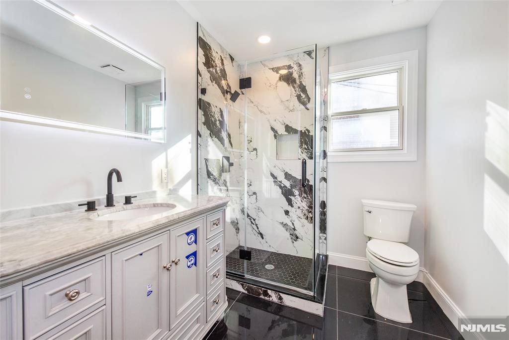 Photo of 50 Grand Avenue, Ridgefield Park, NJ 07660 (MLS # 26022166)