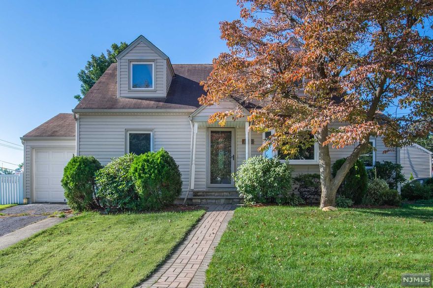 Welcome to this meticulously maintained home in the desirable Allwood section of Clifton! Featuring a functional first floor layout that includes a bright living room and dining room both with hardwood floors. The kitchen has been renovated with tasteful cabinets, granite countertops, and has convenient access to the backyard. The first floor also have two spacious bedrooms with hardwood flooring and a full bathroom. The second floor offers a primary bedroom suite with a full bathroom and ample closet space. The home also has central air, a private fenced in backyard, paver patio, one car garage, and two driveways. The property is located walking distance to NYC bus transportation, near local restaurants, stores, and major highways! This home is move in ready and not to be missed!