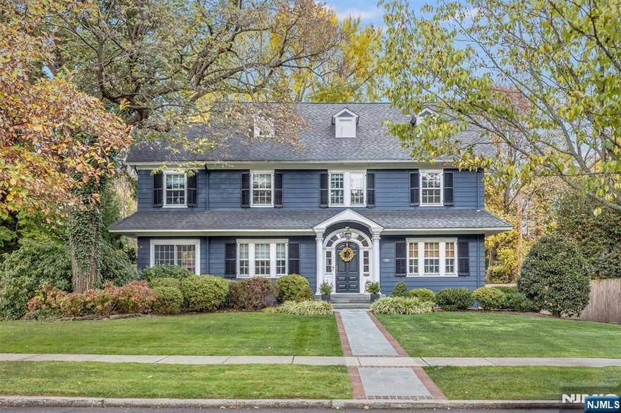 A most gracious and elegant 5 bedroom center hall colonial beautifully appointed with gorgeous original details and character throughout including high beamed ceilings and mouldings, arched entry and hardwood floors.The center hall flow allows for seamless daily living. Entertaining is a dream throughout the 1st floor leading directly to the stunning backyard and patio w/built-in grill and built-in gas fire pit. Upstairs the sophisticated primary ensuite bedrm boasts a spectacular custom walk-in closet&renovated bathrm plus wo add'l bedrms&full bath. Spacious 3rd fl with a bedrm/office and add'l bedrm w/add'l room perfect for homework space plus a 3rd fl bath. Excellent for guests or au pair. Finished bment is the center of activity. Loaded with built-ins, storage,laundry room w/mudroom area&PR. Located in sought-after north end with a it's highly rated school system and hub for the NYC direct train. Close proximity to trending Montclair restaurants, shops and famous farmer's market.