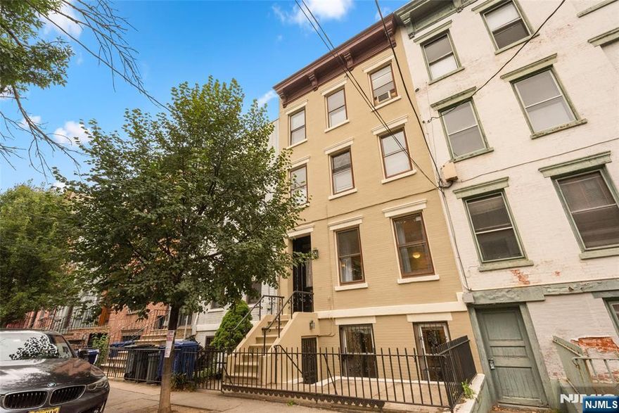 Location Location Location! Just steps from the new Church Square Park on Park Avenue, you'll find 330 Park Avenue - a 20 foot-wide townhouse in the heart of Hoboken. This prime address offers unbeatable proximity to the PATH, bus, ferry, NJ transit trains , and major highways making it a commuter's dream. This home offers incredible potential with a verdant, spacious double-lot backyard. Inside, you'll find three to four bedrooms, four full baths (including two en-suites), high ceilings, abundant natural light, and hardwood floors. Architectural details like exposed brick and elegant curves add character throughout. Additional highlights include outdoor shed, bonus ground-floor apartment/office with separate entrance, excellent flow for both living and entertaining, central air on the top three floors, and ample space to grow. 330 Park Avenue is light, airy and ready to please offering a rare combination of location, space and charm.