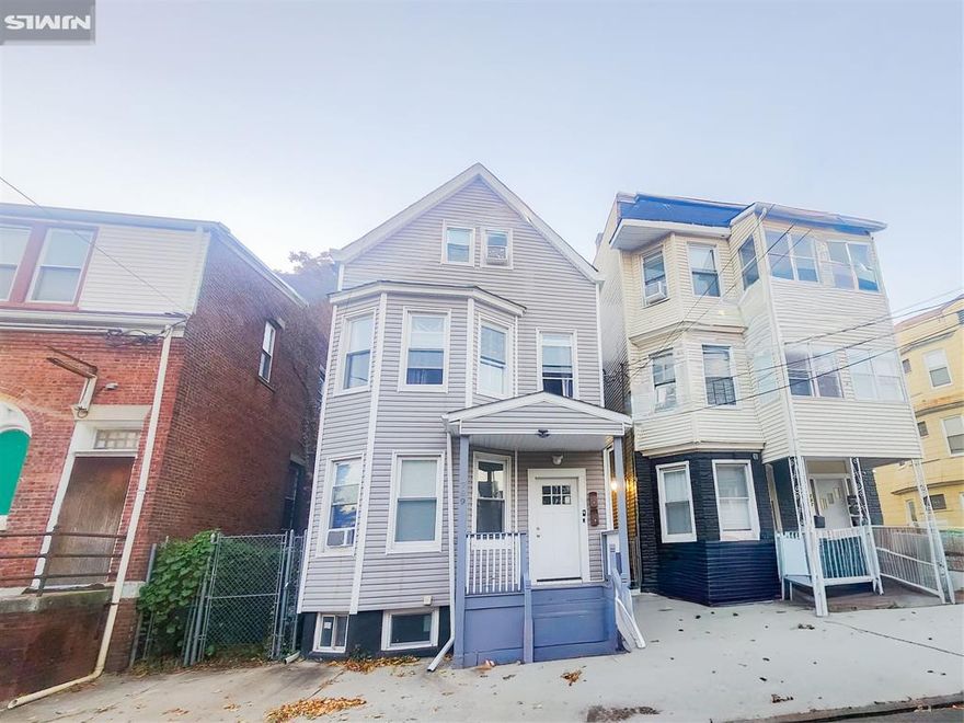 Located in Newark's rapidly appreciating West Side Neighborhood and one of the strongest equity-growth areas in both the city and count. This property boasts fully updated features with high-end finishes, new siding, modern appliances, and upgraded mechanicals for long-term efficiency and reliability. Just minutes from the Garden State Parkway, the property provides excellent regional connectivity while delivering a move-in-ready interior and exterior that align with the area's rising demand and accelerating property values.