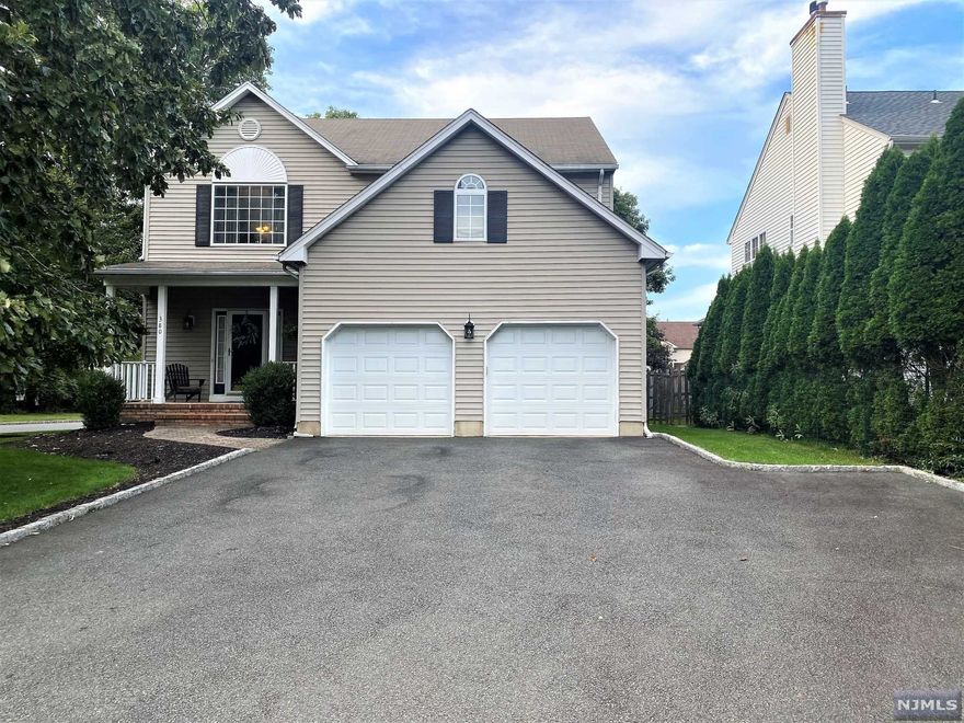 Beautifully Landscaped One Family Corner Lot Colonial!!! First Fl features Grand Entry Foyer w/High Ceilings, Formal DR w/Hardwood Fls, Sunken LR w/Wood Burning FP, Chefs EIK w/Lg Island & Granite Countertops w/Sliding Drs to a Deck. Second Fl consists of Master Ste w/His & Her Closets, Master Bth w/Dbl Sinks, Two addl King-Sized Bedrms, & a Full Bth. Bsmt is Full & Part Finished w/Rec Rm, Utility Rm, & Spacious Open Area w/Laundry. Home is Equipped w/Newer Hot Water Heater, Central Air/Forced Hot Air Unit, and Insulated Garage Doors; all Designed to Save on monthly bills. Home also has Large Backyard, 2 Car Garage, 5 car Driveway, & Cozy Front Porch. Close to Everything! A Must See!!!