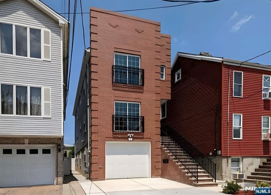 Newer construction style 2 family. This second floor apartment comes with 2 bedrooms and two full baths, modern eat in kitchen, living room and dining room combo, plenty of closets, all appliances, laundry and one parking space. close to Harrison path Station, shopping and all major highways.