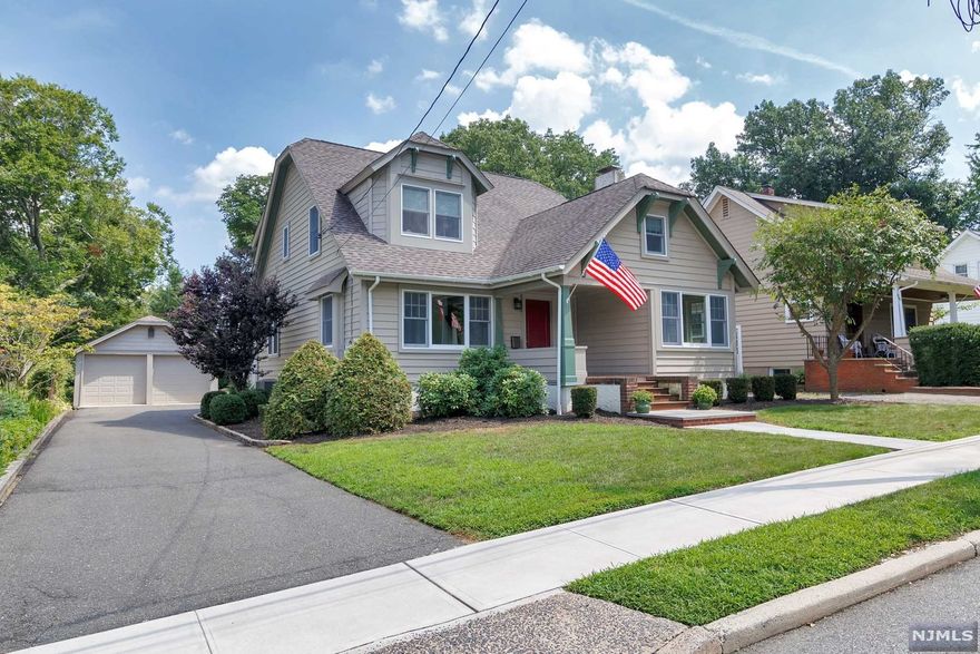 Absolutely beautiful, updated, and expanded Craftsman Colonial in Ridgewood's prestigious Willard district, near public transportation and award-winning schools. Enter into a spacious, bright, and open first that features a formal living room with fireplace, dining room, eat-in kitchen with granite countertops leading to a sunroom that is the perfect work from home destination. Family room with wall of windows and french doors leading to a rear patio, mudroom, and powder room complete the first level. On the second level is a master bedroom suite with a full bath and walk-in closet, three additional generously sized bedrooms, a full hallway bath, and bonus room. The basement is fully finished with an additional family room, laundry room, and plenty of storage. Amazing curb appeal in a prime location with an expansive and level backyard, and 2-car garage just a block from Willard Elementary School, and close to NYC bus and train service.