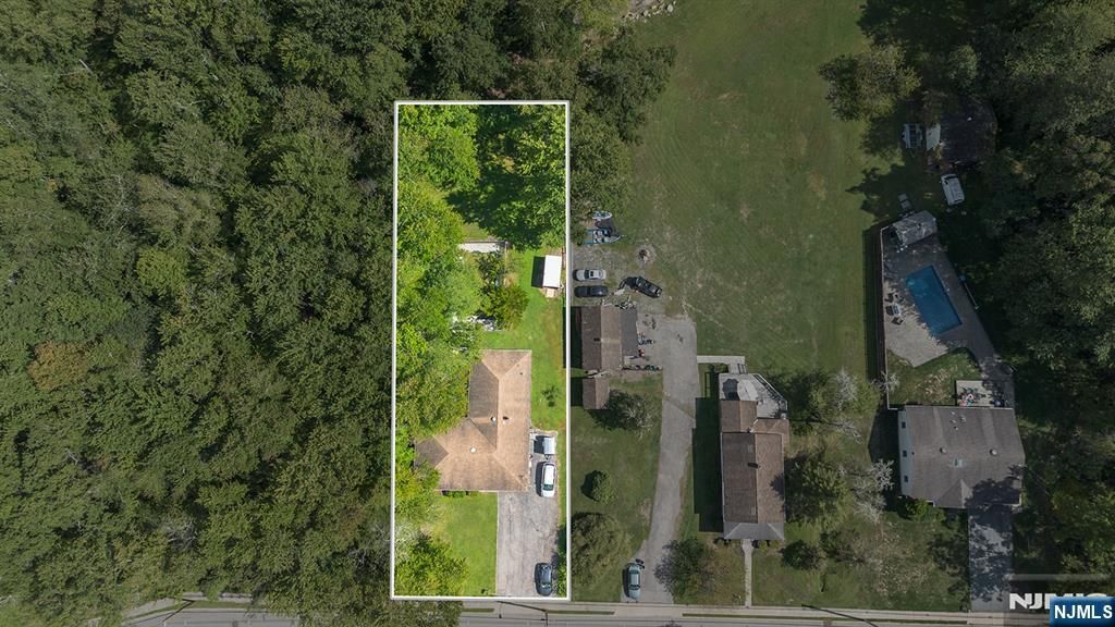 Photo of 114 Van Dam Avenue, Bloomingdale, NJ 07403 (MLS # 26013216)