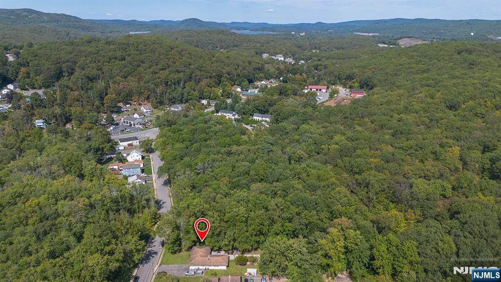 Photo of 114 Van Dam Avenue, Bloomingdale, NJ 07403 (MLS # 26013216)