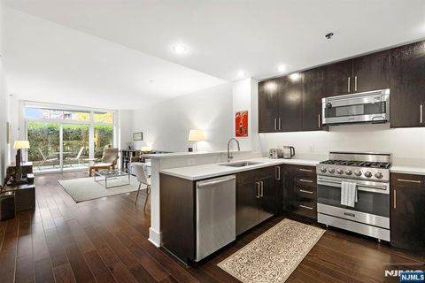Photo of 1100 Maxwell Lane #406, Hoboken, NJ 07030 (MLS # 25037258)