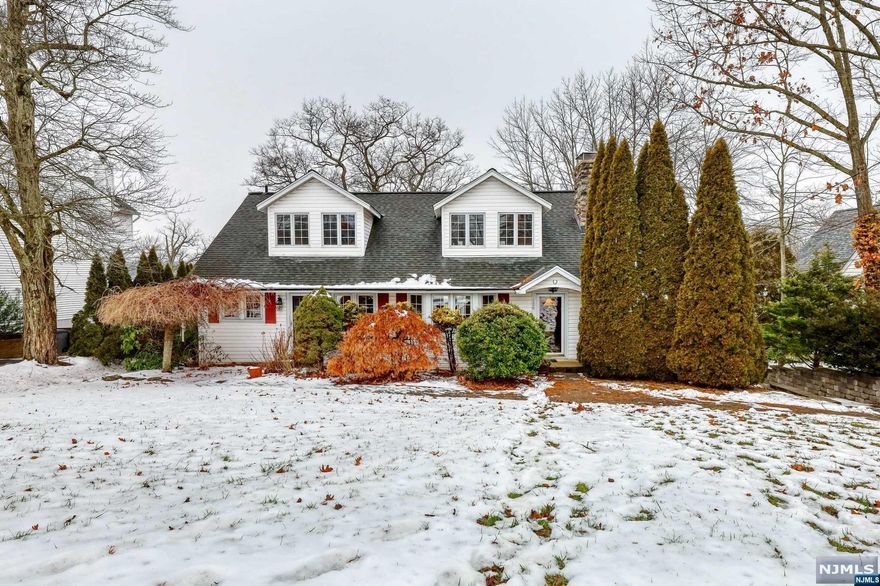 Welcome to this Awosting Lakefront gem on Greenwood Lake's East Shore! This 4BR, 4BA custom home epitomizes lakeside living with stunning sunset views. The main floor's open plan is perfect for entertaining, featuring a living room with stone fireplace, a spacious dining area, and a kitchen with ample cabinet space. Enjoy lake views from the family room. The first floor boasts a master suite with a full bath and sitting area. Upstairs, another master suite, 2 bedrooms, and a full bath with a clawfoot tub await. The basement includes laundry, storage, and a 1-car garage. Step onto the large deck overlooking a yard leading to the lake and your own dock. Awosting offers year-round community events, a new clubhouse, sports courts, a playground, and more. Seize the opportunity to own this lakeside haven!