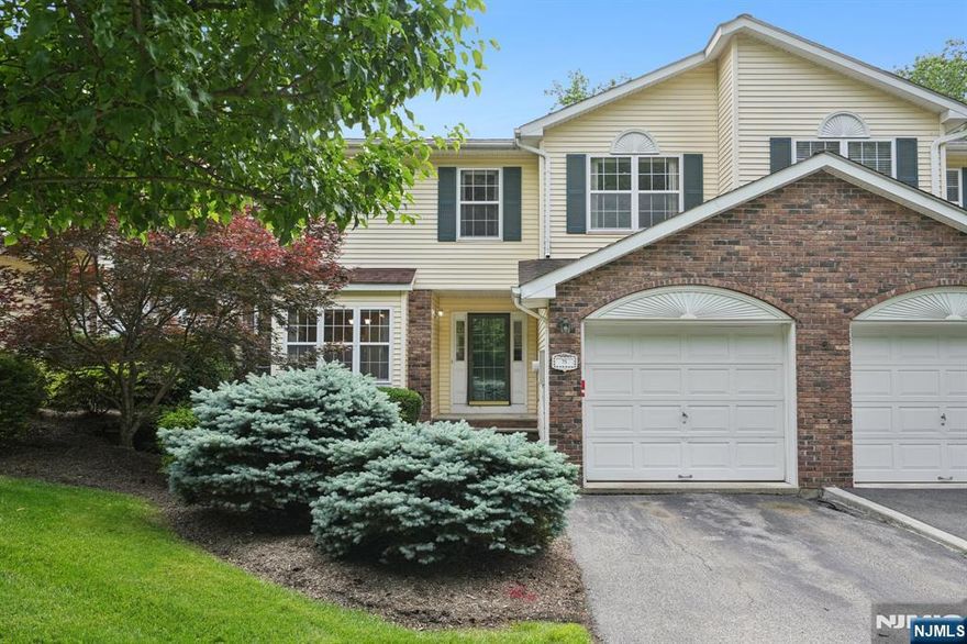 Welcome to Timber Valley, one of Wayne's most desirable and private townhouse communities. This spacious multi-level townhome offers a rare opportunity to create a home that perfectly reflects your style and needs. This particular unit stands out with a recently finished basement, a feature not found in all Timber Valley homes, adding valuable additional living space perfect for a play room, home office, gym, or creative studio. The main level offers a bright, open layout with an eat-in kitchen, formal dining room, and vaulted living room that opens to a private deck. Upstairs features 2 generously sized bedrooms, 2 full bathrooms, and a bonus den that can easily serve as a 3rd bedroom or flex space. A powder room, laundry/mudroom, and attached 1-car garage with direct access complete the home's functional design. While the home is ready for cosmetic updates, it provides a fantastic canvas to customize and add value in a sought-after location. Don't miss this rare opportunity to own a finished-basement unit in Timber Valley, ideally located near top-rated schools, shopping, major highways, and NJ Transit.