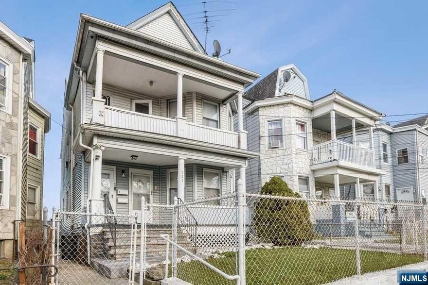 OFFERS DUE on WED. 12/6 by 12:00 PM.Property will be conveyed w/tenants, however notice can be given to tenants once buyer obtains loan commitment. Leases are month to month. Welcome to 121 Graham Ave in Paterson, an amazing opportunity to own a large, well-maintained 2-family home. Step inside the home's first-floor unit, which offers a living room, dining room, 2 bedrooms, 1 bathroom, and kitchen. The second unit offers 2 full floors of living space featuring a living room, dining room, 5 bedrooms, 2 bathrooms, a kitchen, and a nice porch for extra entertaining space. Both units feature beautiful Hardwood floors throughout main living areas. Recent updates have been made to both kitchens and front landscaping. Seller has removed UST (May '22), repaired the roof (May '22) and installed 2 new boilers (Nov '23). House sits on a nice fenced-in lot. Both units have steady paying tenants on month to month leases. Rents are currently below market.
