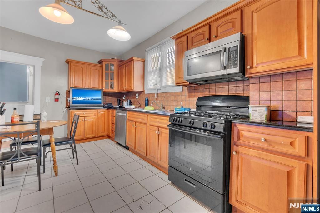 Photo of 42 Nairn Place, Newark, NJ 07108 (MLS # 25036778)