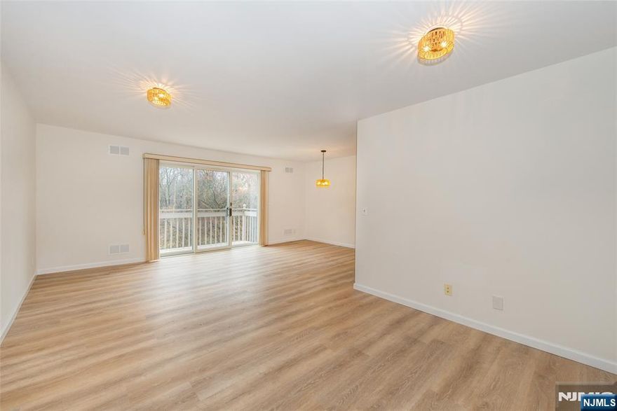 Charming 2-Bed, 2-Bath Condo with Modern Updates & Tranquil Views! Welcome home to this beautifully updated 2-bedroom, 2-bathroom condo. Step inside to brand-new flooring, fresh paint throughout & modern touches that make this home move-in ready. The updated kitchen boasts newer appliances, while both bathrooms feature brand-new toilets. New lighting fixtures enhance the unit's generous natural light. Enjoy your morning coffee or unwind in the evening on your private balcony offering a picturesque view. Includes a tandem 1-car garage, private storage rm & ample parking for guests. With low HOA fees, youâ€™ll enjoy affordability without sacrificing comfort. Located in a vibrant community, residents have access to fantastic amenities, including town pool, community center, and multiple transit optionsâ€”2 train stations & several NYC bus stops. This home is within the highly sought-after Fair Lawn School District. Schedule your showing today! Certified Emotional Support Animals welcome.