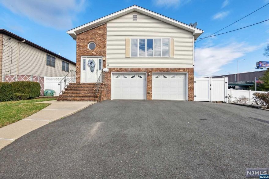 Welcome to this expansive and versatile bi-level home boasting 4 bedrooms/3 bathrooms and providing the perfect balance between suburban tranquility & urban accessibility. This 2500sqft home provides a perfect blend of comfort, convenience, and practicality! The modern eat-in kitchen, inviting living room, and practical dining room offer an efficient space for gatherings & entertainment! Primary Bedroom/Full Bath, and two additional bedrooms & a hall Full Bath complete the first floor. The lower level features a kitchenette, recreation room, bedroom/office, full bath, laundry & storage! Lower level offers flexibility and ease to accommodate large gatherings effortlessly both indoor/outdoor, as it has access directly to a fenced-in yard. Enjoy BBQ's, outdoor enjoyment, & relaxation! Conveniently located with easy access to NYC bus/transportation, major highways, shopping, parks, & schools! 2-car garage too! Don't miss the opportunity to make this practical and inviting home yours!