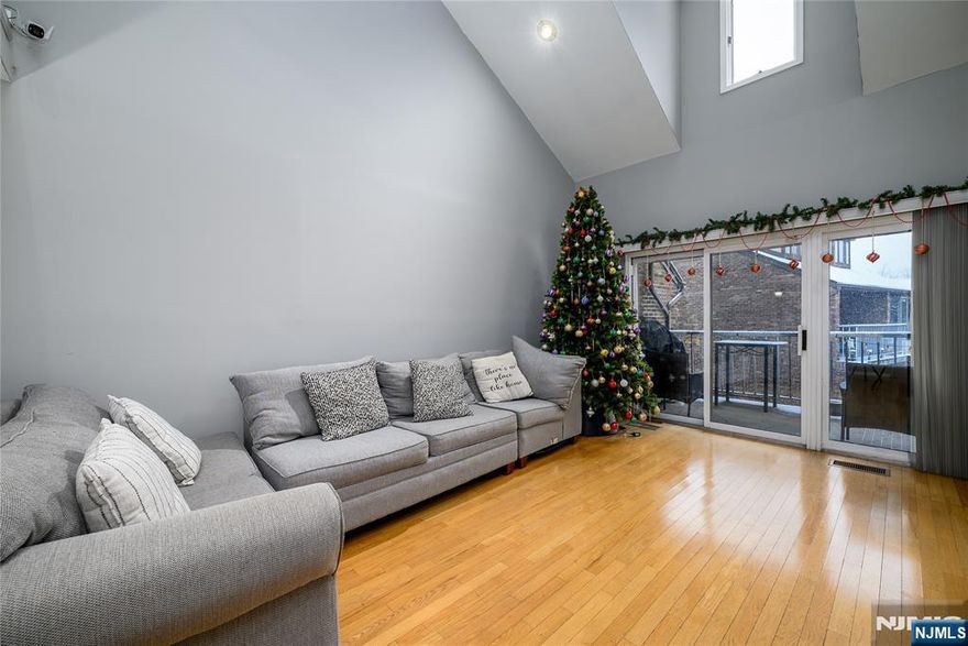 Spacious and bright 1,500 SF 3-bedroom condominium with a loft-style layout in the lovely Hamilton Crest condominium complex. High ceilings and an open living and dining area filled with natural light. The kitchen offers ample cabinetry, generous counter space, and stainless steel appliances. Sliding doors lead to a private balcony overlooking green space, providing a peaceful outdoor setting.The home includes comfortable bedrooms, well-maintained bathrooms, and a large private storage area in the basement. A spiral staircase adds architectural character while maximizing space and functionality. Located in a quiet community with convenient access to major highways and an easy commute to NYC.