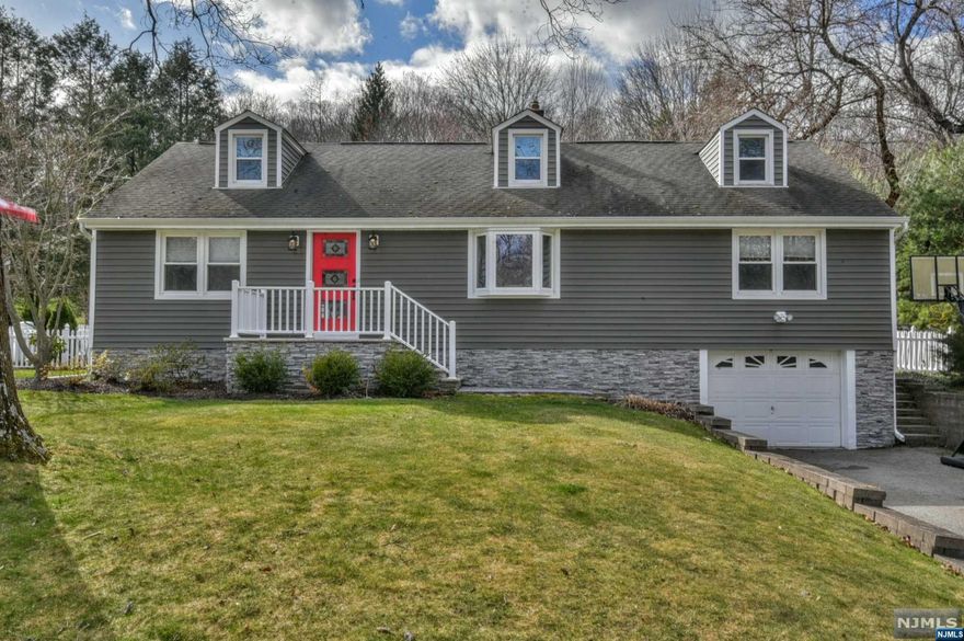 Fantastic opportunity to own in Kinnelon! This wonderful 4 BR cape w/generous 1st floor living space & fabulous backyard is ideal for indoor or outdoor entertaining. From the inviting front door to the large open concept living & family rooms, the space is perfect for guests to gather. This home offers 2 BR & 2 BA on the 1st floor for those looking for one floor living, as well as 2 additional BR on the 2nd floor and a finished basement. Potential office with separate entry. Enjoy your days relaxing on the paver patio, by the heated pool or playing in the flat, fenced backyard. The ultimate staycation!