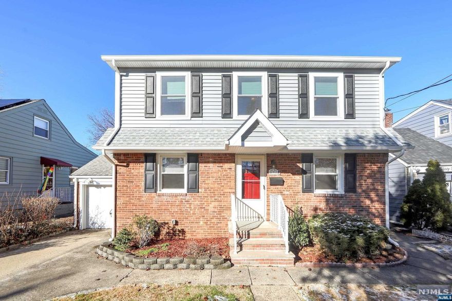 Welcome to this wonderful property in the lovely Birchwood section of Elmwood Park. The first floor features a living room, 2 bedrooms (one can be a DR), kitchen, and 3-season porch with access to the large and level rear year. Head upstairs for a fabulous surprise: the 2-year-old upper level renovation which provides a large primary bedroom with walk-in closet, large full bathroom, large living area/bonus room, and another bedroom. Also updated were the electrical panel, vinyl siding, and there's a new roof! 2-zone forced hot air heating/central air conditioning, newer windows throughout, attached garage, and storage space in the unfinished basement are additional features. Neighborhood park is just down the street. Ready for its next chapter, let's make this house your home!