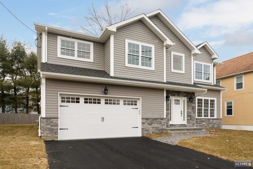 Brand new construction designed & built by one of the areas top architects and developers. Modern in design with high end finishes, this 4 bedroom 2.1 bath open and bright split level is convenient to town and the blue ribbon school system. Enter the home into a dramatic 2 story foyer and formal living space. First floor includes 1/2 bath, custom kitchen with top of the line appliances that opens to a family room with gas fireplace, a large dining room, powder room, and 2 car garage. Upstairs includes the master bed and bath suite, 3 additional bedrooms and 1 additional full bath. Backyard is perfect for play and entertaining. 10 year builder warranty.