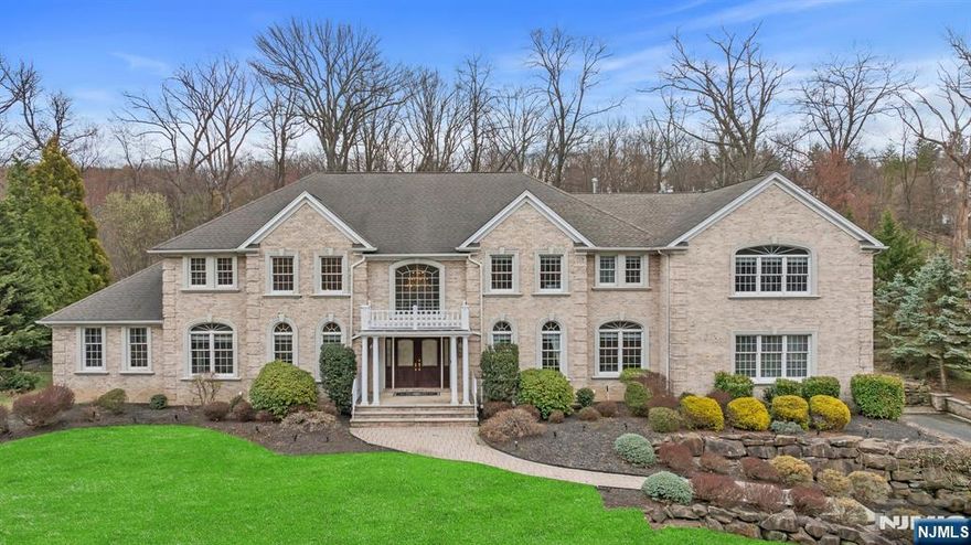 Step into sophistication in this 5,400+ sq. ft. estate where timeless elegance meets modern comfort. A grand 2-story marble foyer sets the stage. To the left, a soaring formal living room and office w/gas fireplace create a warm welcome. To the right, the formal dining room is perfect for elegant gatherings. The chefâ€™s kitchen boasts Sub-Zero fridge, double ovens, gas cooktop w/warming drawer, 2 dishwashers, and a beverage center w/sink. An expansive great room w/double-sided gas fireplace flows into a conservatory w/French doors, tray ceiling, and patio access. A family room over the garage is plumbed for a wet bar. The first floor also includes a bedroom, full bath, powder room, laundry, and Brazilian hardwood floors. Upstairs, the primary suite features a private office, fireplace, walk-in closet, and new marble spa bath w/dual sinks, soaking tub, and large shower. Three more en-suites and a 2nd laundry room complete the home. A stunning blend of luxury and livability!