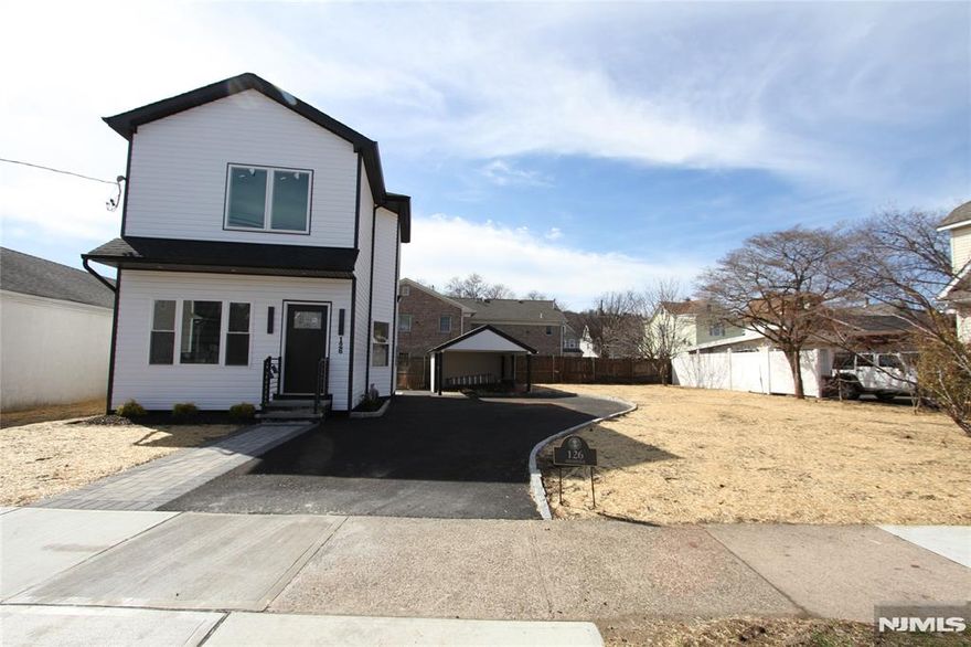 Come see this totally new home inclucing the foundation on a spacious level lot. House was taken down and completly built to todays standards! The open floor plan and bright modern finishes can suit many lifestyles. The carport can even double as a covered patio!