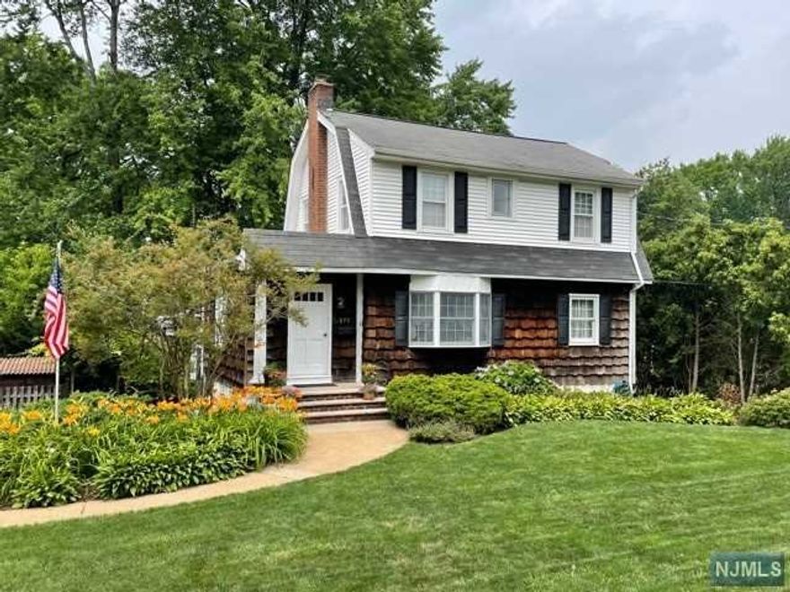 Beautifully Kept Expanded Dutch Colonial Huge Family Room with wood burning stove and Den/Potential 2nd Bath Commuter's Dream, Close to NYC, Mall Near By Great move in ready Maywood home with charm. Entrance foyer with coat closet into living room with wood burning fireplace, open to den and dining room. Tremendous family room addition with gas baseboard heat and wood-burning stove, vaulted ceiling with skylights and slate floor off of the kitchen onto the deck. 3 bedrooms and 1 full bath on the second story and partially finished basement with laundry, bonus room, and ground access. Beautiful backyard with pond and entertaining space.