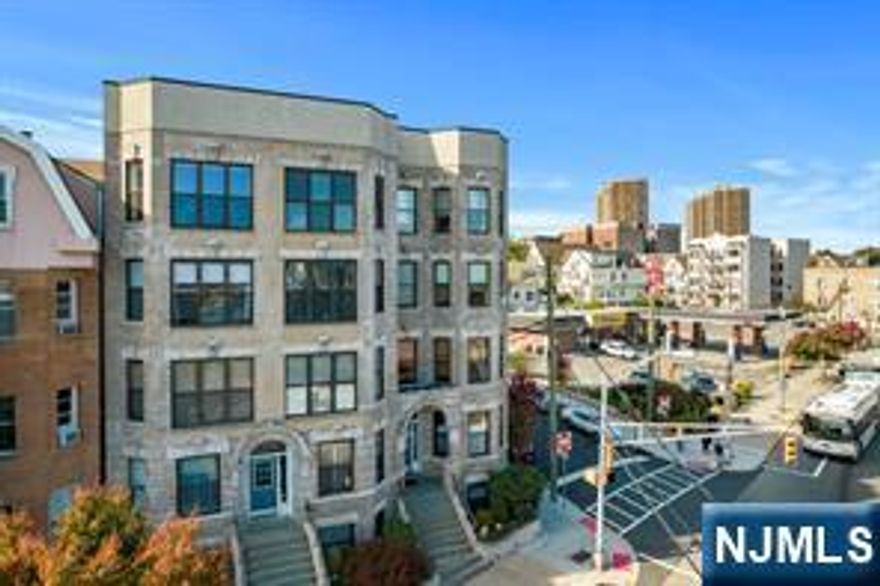 Bright Corner unit, Beautiful Boutique Building with on site laundry, Open Kitchen, LR, Dining area, ample closet space, clear views, of NYC , NY Bus on the corner close to shopping, Bedroom offers king size murphy bed,