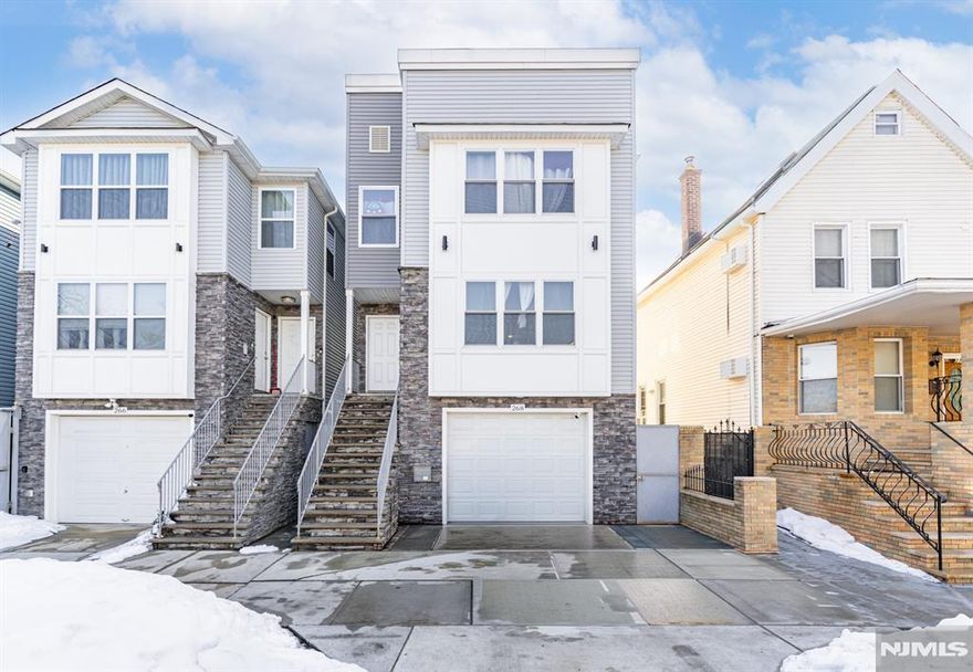 NEWLY BUILT, UNIQUE two-family featuring a rare ground-level unit with 2 rooms and a full bath, home office, or added flexibility. The definition of turnkey, located in North Newark, bordering Bloomfield and Belleville. Built by an experienced builder with no expense spared, showcasing quality craftsmanship, modern finishes, and thoughtful design throughout. ideal for Owner-occupants or investors seeking low maintenance, strong rental appeal, and long-term value in a high-demand location close to major transportation, shopping, and dining. come turn this house into a home before someone else does!