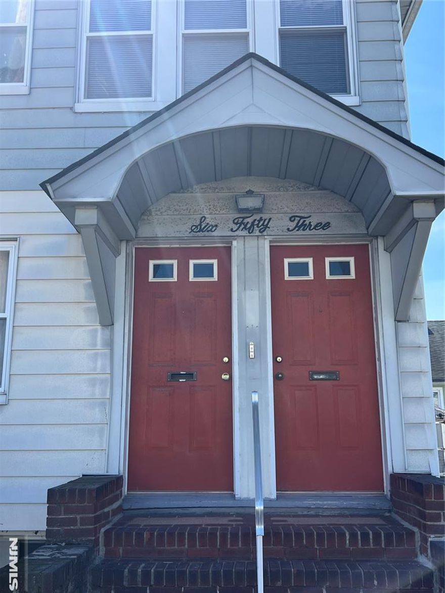 GREAT opportunity for those looking for a two family in a great town to live in or as a solid investment. Both floors feature 2 bedrooms, a bonus room, an eat in kitchen, living room with stained glass window, formal dining room with picture frame molding, a full bath with tub/shower combo First flr kitchen has dishwasher, wall oven & refrigerator included. Rare American chestnut wood trim and hardwood floors throughout.All replacement windows. Plenty of storage in the full unfinished walk out basement (bilco door) and laundry (washer/dryer included). Detached two car garage & additional parking for up to 4 cars. Full unfinished attic with fully insulated floor ready to expand to additional 3rd unit, expand 2nd flr living space or more storage.Separate utilites with one furnace 1 yr. old. Corner lot with side street a no through street. Delivered vacant. Prime commuter location close to NYC transit, public transportation, highways, restaurants, parks, schools and shopping. Being sold "as is" . Tank has been decommissioned and paperwork available.