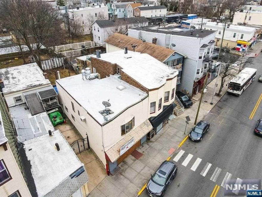 Unlock the Potential: Invest in Greenville's Hidden Gem! Discover the perfect blend of opportunity and potential with our incredible mixed-use property nestled in the vibrant heart of Greenville, Jersey City. Income-Making Property: This gem boasts a second-floor, two-bedroom apartment with the tantalizing potential for expansion into a three-bedroom haven. Plus, seize the opportunity to harness the bustling storefront on the first floor for lucrative business ventures.