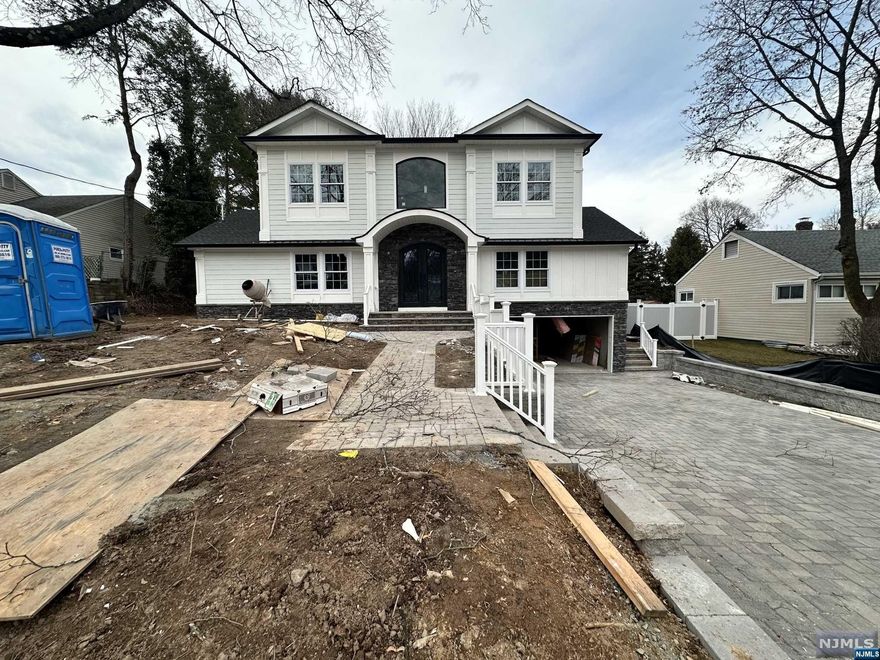 NEW CONSTRUCTION Existing Foundation to be completed in Spring 2024. This Luxurious new home sits on a secluded street close to downtown Cresskill and is being built by one of Bergen County's Top Builders, NJ North Development. Your first floor offers LR & DR w millwork & fireplace which flows into your Chef's kitchen w/ Top-Line SS Appliances, Cabntry, pantry, waterfall Island & Granite Countertops accented w/ lux porcelain backsplash & accent lighting. 1st flr also consists of pwdr rm and guest suite with full bthrm. 2nd flr consists of HUGE primary suite w/ high ceilings throughout, custom millwork & fireplace, w/i closets, and your spa like primary bath w soaking tub, porcelain tile, double vanities, top line fixtures and heated floors. 2 addtnl bdrm w/ ensuite bthrms & lndry rm complete your 2nd flr. Huge fin. bsmnt w/ Rec Room and HBth, Attchd 2 Car Garage, patio and fenced backyard complete your home. Pictures are of similar listing and are subject to change.