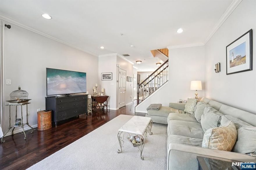 Experience refined waterfront living in the prestigious Jacobs & Bulls Ferry community. This beautifully appointed Fanwood-style townhouse features 3 bedrooms and 3.5 bathrooms, ideally positioned on one of the communityâ€™s most desirable streets, offering sweeping Hudson River and NYC skyline views from nearly every window. With north, south, and west exposures, the home is bathed in natural light throughout the day. Spanning approximately 2,341 sq ft across four levels, the residence showcases hardwood floors throughout and a well-designed, functional layout. The main level features a modern kitchen equipped with stainless steel appliances, seamlessly flowing into the living and dining areas. The third floor includes a guest suite with a private bath and an expansive primary suite complete with a walk-in closet and a spa-inspired bathroom featuring double vanities, a separate shower, and a soaking tub. The top level offers versatile living space ideal for a bedroom, office, or den, along with a private balcony capturing breathtaking views. The lower level adds even more flexibility with an additional bedroom, full bath, and walkout patio. Additional highlights include two-car parking and an in-unit washer/dryer. Residents enjoy premium amenities including pools with jacuzzi, childrenâ€™s play area, 24/7 security, and a complimentary shuttle to the ferry and light railâ€”providing effortless access to NYC.