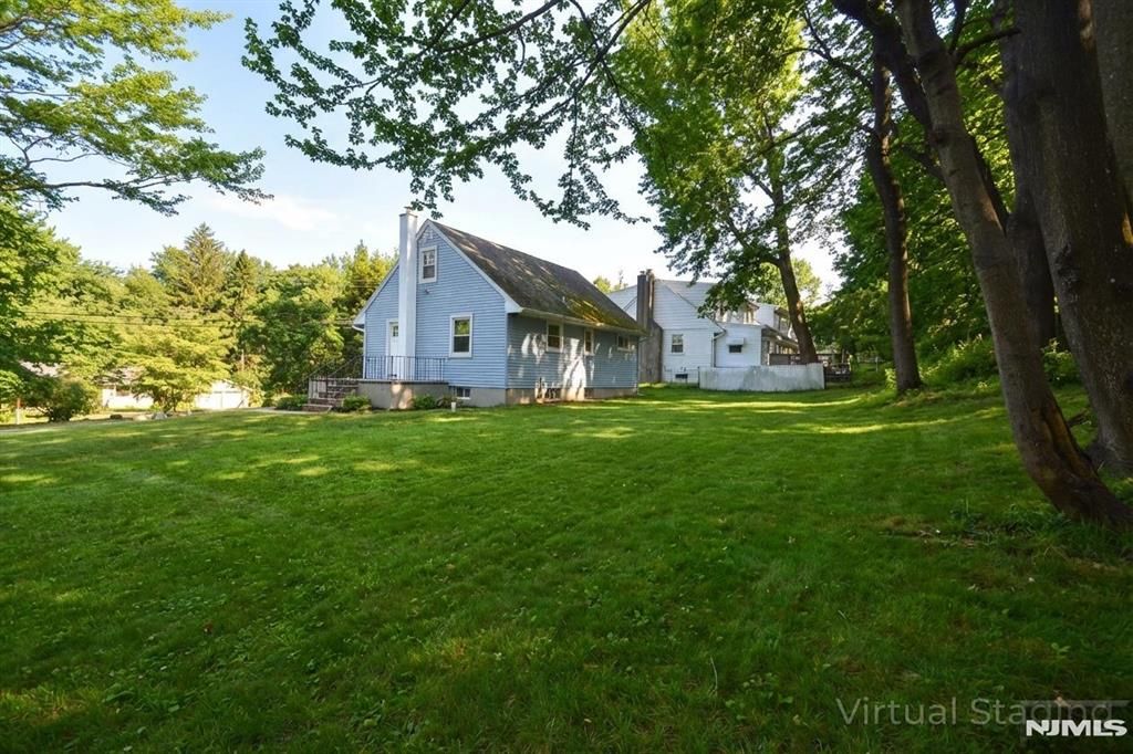 Photo of 454 Rifle Camp Road, Woodland Park, NJ 07424 (MLS # 26007715)