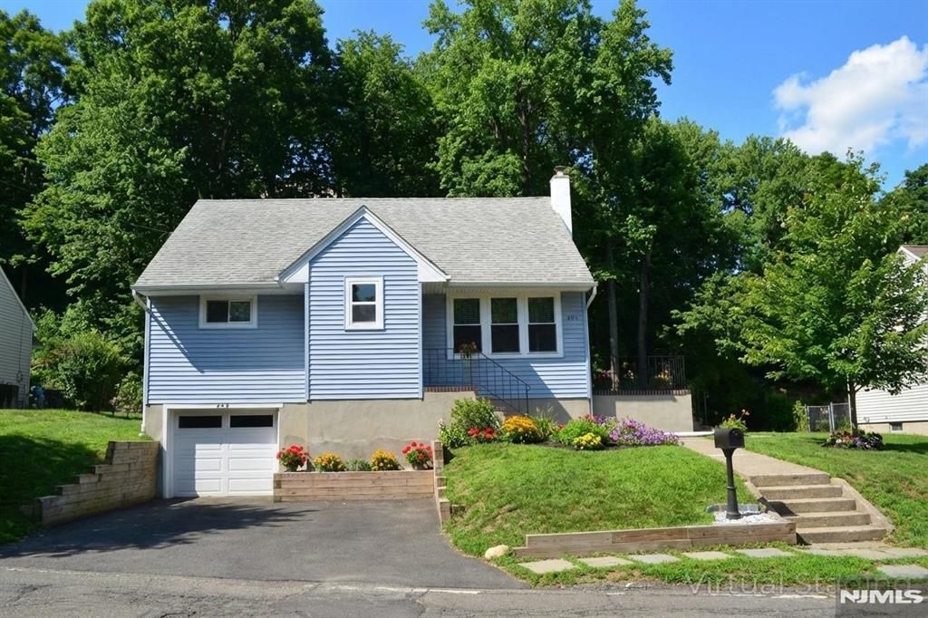 Photo of 454 Rifle Camp Road, Woodland Park, NJ 07424 (MLS # 26007715)