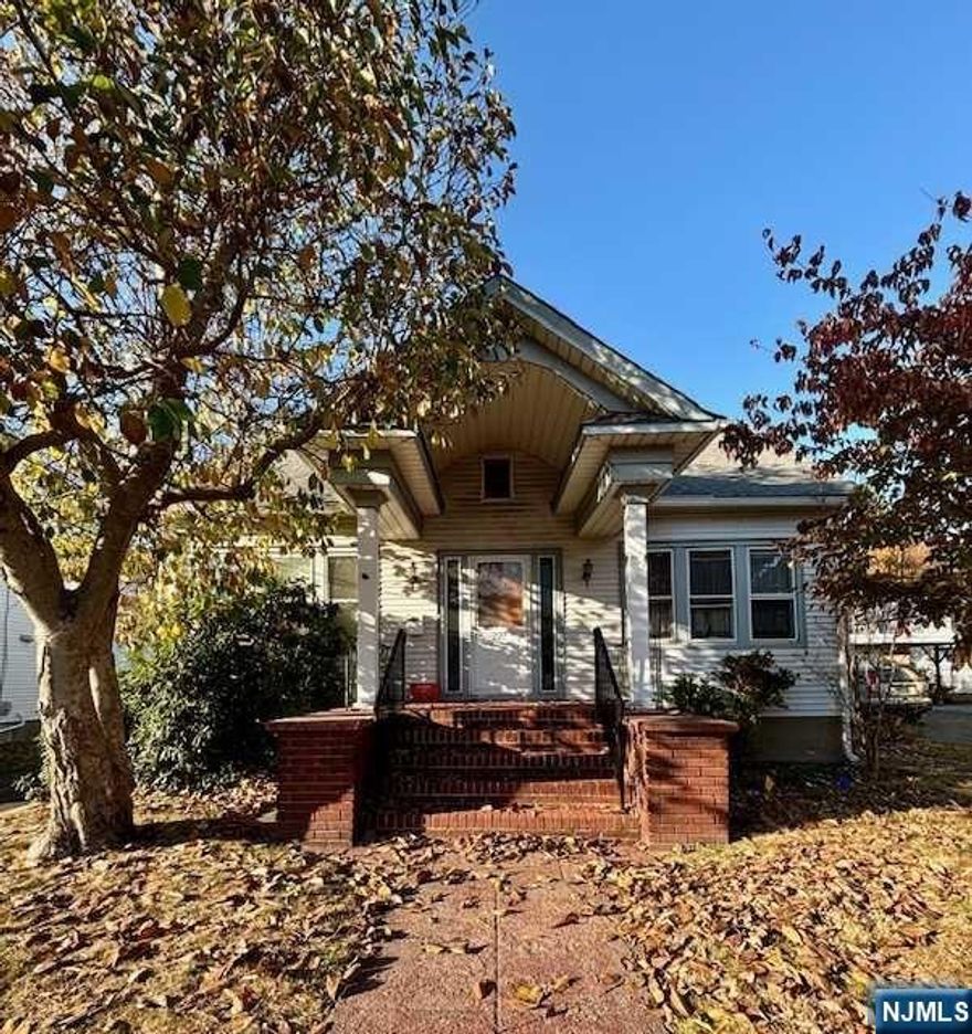 Perfect fixer upper in prime location.