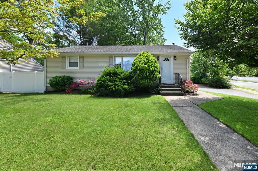 Step into this beautifully remodeled ranch-style home, where comfort and style meet! The main level features an open layout with gleaming hardwood floors, a spacious living room, and a stunning kitchen that flows seamlessly into the dining area. The oversized primary bedroom boasts a walk-in closet and cozy sitting areaâ€”formerly two bedrooms, it could easily be converted back. The fully finished basement offers two legal bedrooms with egress window, a full bath, a bright sitting area, laundry, and plenty of storage. Enjoy modern bathrooms, updated utilities, a fenced yard, and a convenient circular driveway. Located close to schools, parks, and shopping, this move-in ready gem is a must-see!