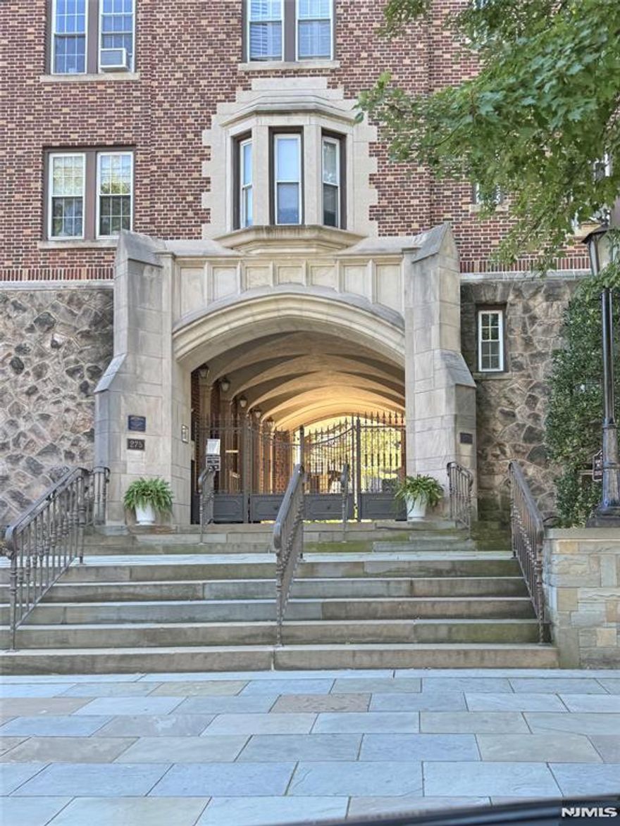 Spacious two bedroom apartment in Tudor Hall near Englewoods East Hill. Partially updated kitchen with opening to the Living Room. Lovely hardwood floors, high cielings, charming, gated courtyard in delightful Pre-War Brick building.