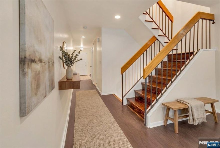 Open House 1.10.26 1-3PM & 1.11.26 12-2PM Welcome to this beautifully maintained 4-bedroom, 2.5-bath interior-unit townhouse offering space, comfort, and modern updates throughout. Designed for todayâ€™s lifestyle, this move-in ready home features hardwood floors throughout, creating a warm and cohesive flow across all living levels. The main living area offers a bright, open layout ideal for both everyday living and entertaining. Large windows provide abundant natural light, enhancing the homeâ€™s inviting atmosphere. The updated kitchen features modern cabinetry, ample counter space, and contemporary finishes, making it both functional and stylish. All bathrooms have been tastefully updated with quality fixtures and clean, modern design. The home includes two full bathrooms and one half bath, providing convenience for residents and guests alike. ??The home features four generously sized bedrooms, each offering flexibility for sleeping, home office, or guest use. Additional highlights include a one-car garage offering secure parking and extra storage, as well as the benefits of an interior-unit townhouse, which provides added privacy and energy efficiency with low-maintenance living. Key features include: 4 bedrooms, 2.5 bathrooms Hardwood floors throughout Updated kitchen and bathrooms Spacious, light-filled layout One-car garage Interior-unit townhouse This property offers the ideal combination of space, updates, and convenience.