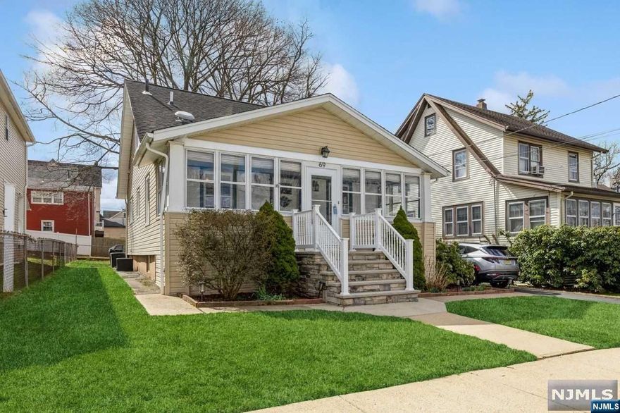 Welcome to this charmingly updated Cape Cod home in the desirable Dumont area, perfectly marrying old-school charm with modern touches across 3 bedrooms and 2 baths. Upon entering, find solace in a cozy, fully enclosed porch, offering a peaceful retreat from the day-to-day hustle. Inside, the living and dining areas are illuminated with natural light, setting the stage for memorable gatherings. The kitchen, thoughtfully updated, features stainless steel appliances, quartz countertops, and recessed lighting. The first floor is further enhanced by a modern bath with a heated floor. Upstairs, the primary bedroom boasts a beautiful bath with a steam shower enhanced by heated floor, creating a private spa experience. The property also features a backyard space perfect for outdoor barbecues and cozy fires, making it an ideal setting for entertaining or simply enjoying peaceful evenings. With its prime location near major highways, shopping, and one block away from easy access to NYC.